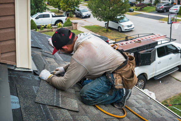 Professional Roofing technician working in Goose Lake, IA